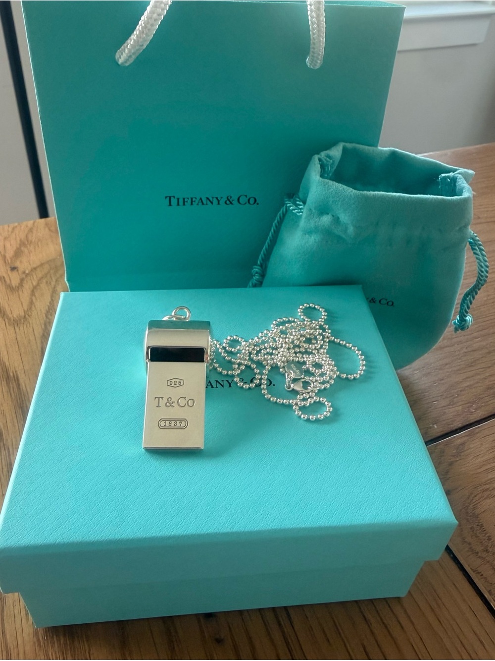 Tiffany & Co. Sterling Silver Whistle Pendant on a 36" Beaded Chain Necklace